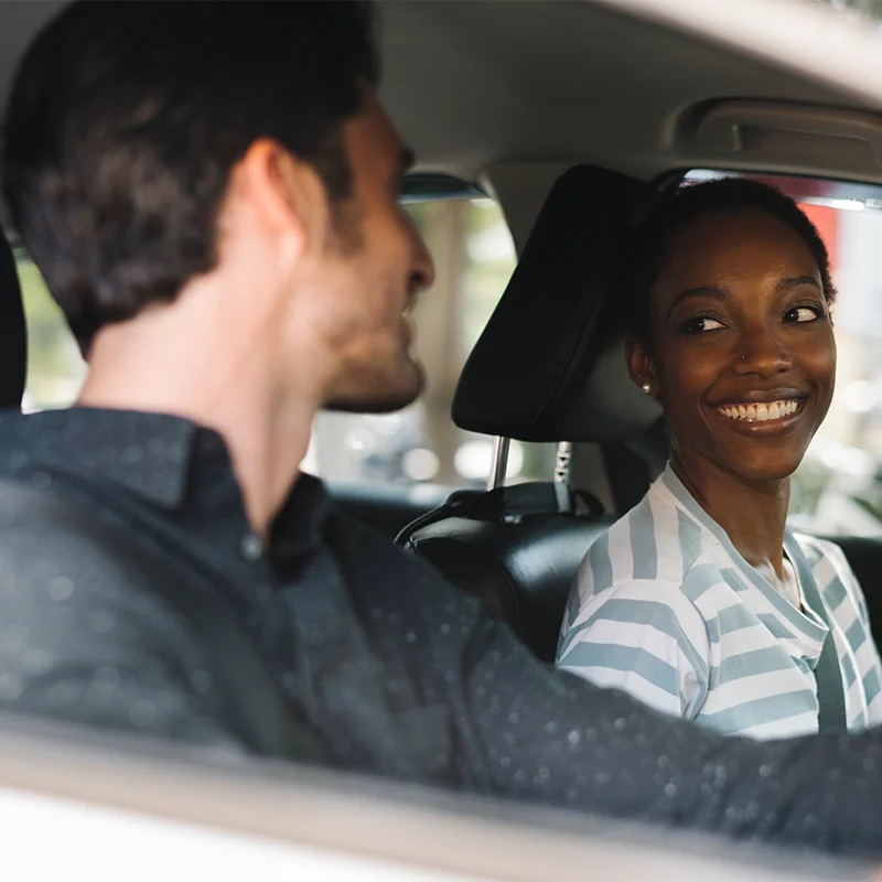 Woman with car - Temporary Insurance via GoShorty